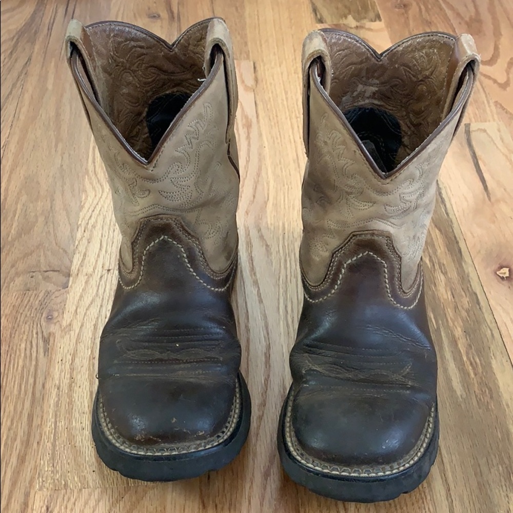 Worn, authentic, broken in cowboy boots